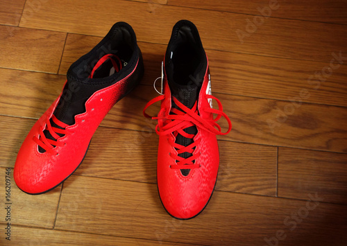 Football boots isolated - red