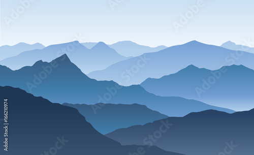 Blue vector landscape with silhouettes of misty mountains © Kateina