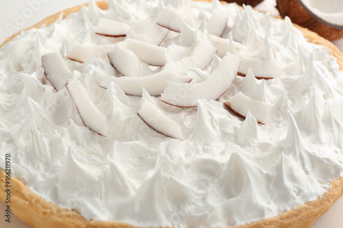 Delicious cream pie with pieces of coconut, closeup