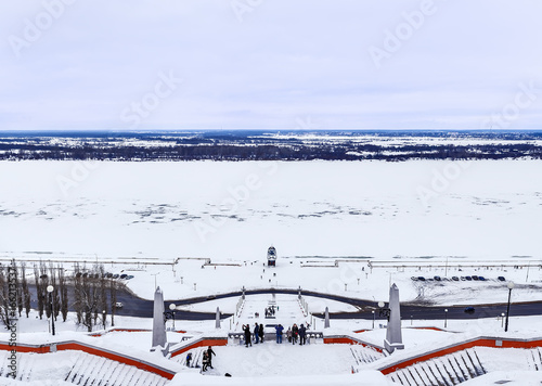 Kremlin is a fortress in the historic city center of Nizhny Novgorod, Chkalov ladder (also Volzhskaya staircase) staircase in Russia. Winter. photo