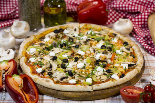 Italian pizza with mushrooms, cheese and olives. Classical Italian pizza.