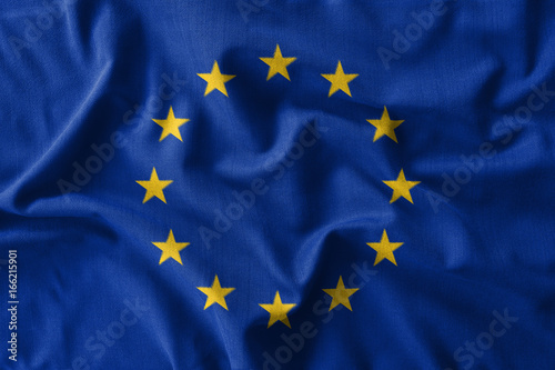 European Union ( EU ) flag painting on high detail of wave cotton fabrics . 3D illustration