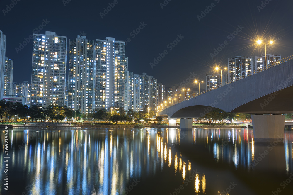 Fototapeta premium High rise residential building in Hong Kong city at night