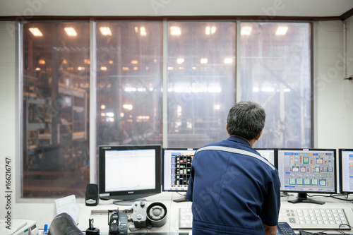 Engineer in control room.