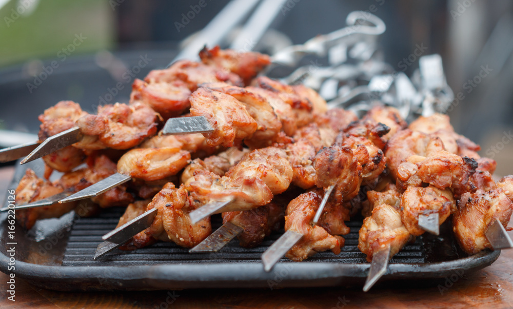 Shashlik. Kebab. Grilled marinated meat with spices. Pork. Beef. Lamb. Selective focus Shashlik. Kebab. Grilled marinated meat with spices. Pork. Beef. Lamb. Selective focus