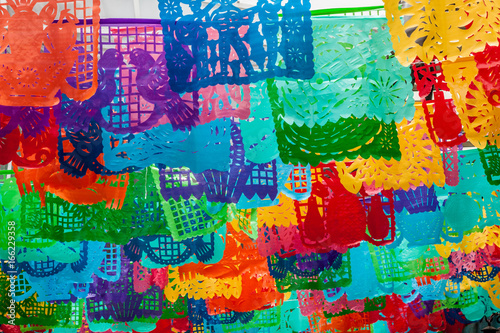 Fondo colorido de adornos de papel tradicionales en México. Pelicula coco photo