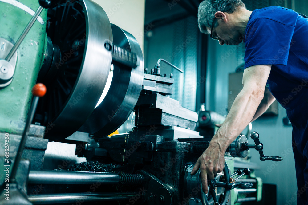 modern industrial machine operator working in factory modern industrial machine operator working in factory