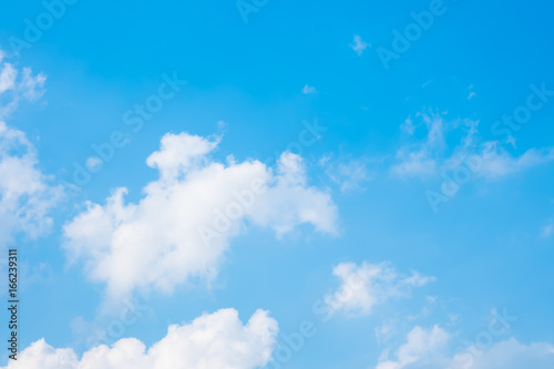 blue sky background with a tiny clouds © dadatop