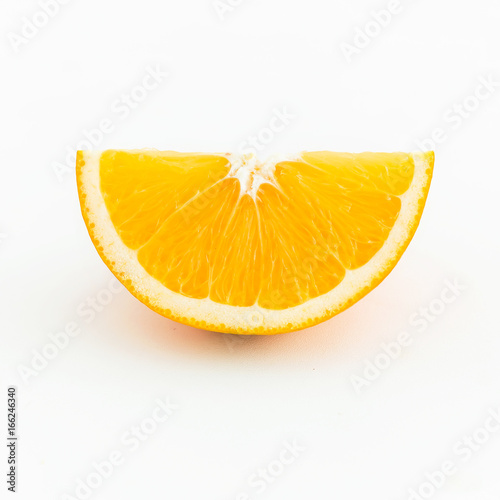 Slice of orange isolated on white background. Flat lay, top view