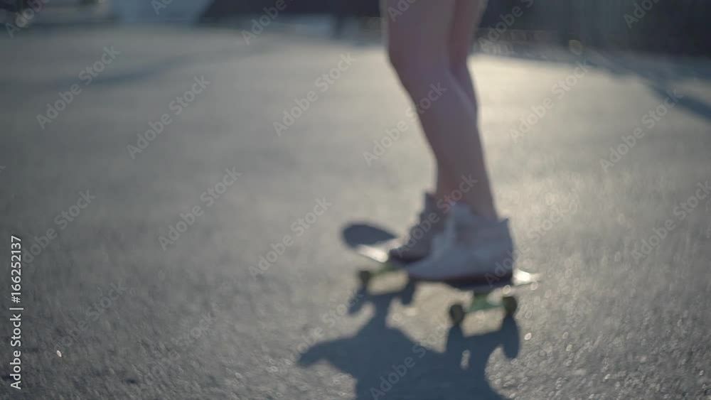 Young lady feet with skateboard Young lady feet with skateboard