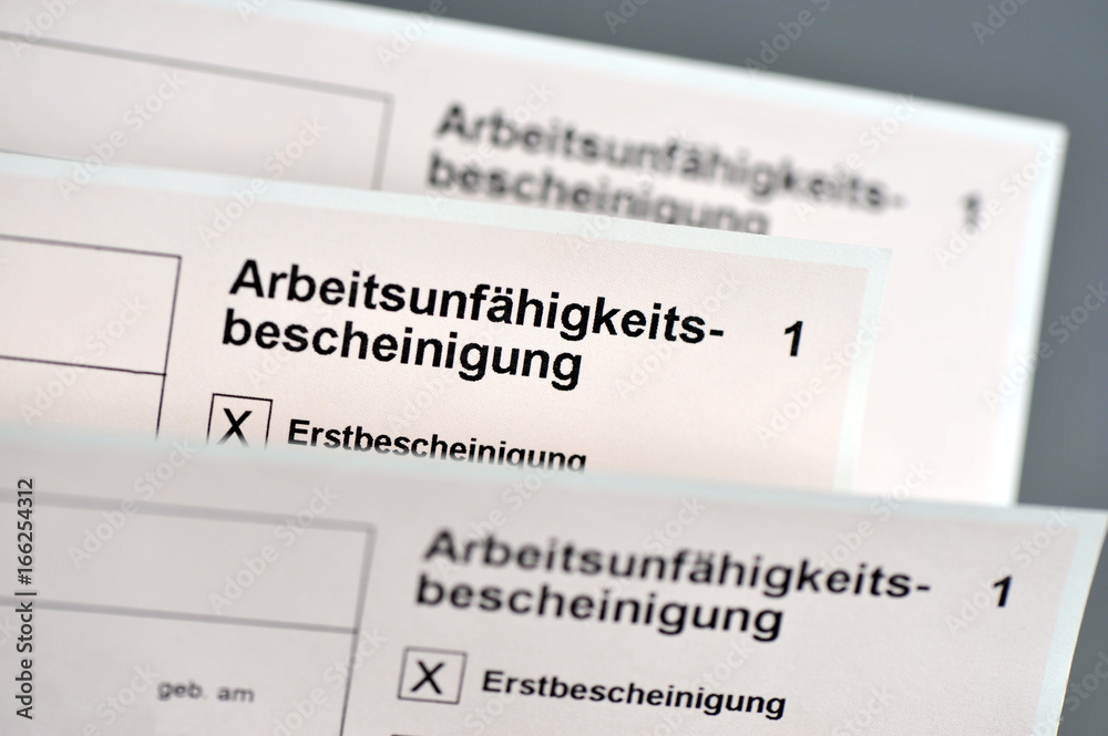 Arbeitsunfähigkeitsbescheinigung, Krankmeldung, Krankheit, Arzt, Doktor, Arbeitgeber, Krankenkasse, Fehlzeiten, gelber Urlaubsschein, Formular, Bescheinigung, Attest, Unschärfe Arbeitsunfähigkeitsbescheinigung, Krankmeldung, Krankheit, Arzt, Doktor, Arbeitgeber, Krankenkasse, Fehlzeiten, gelber Urlaubsschein, Formular, Bescheinigung, Attest, Unschärfe