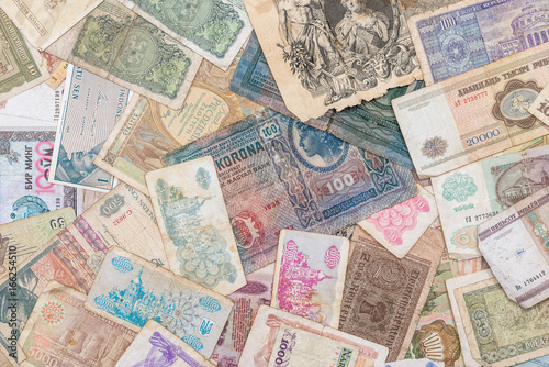 Old world paper money of different countries as background