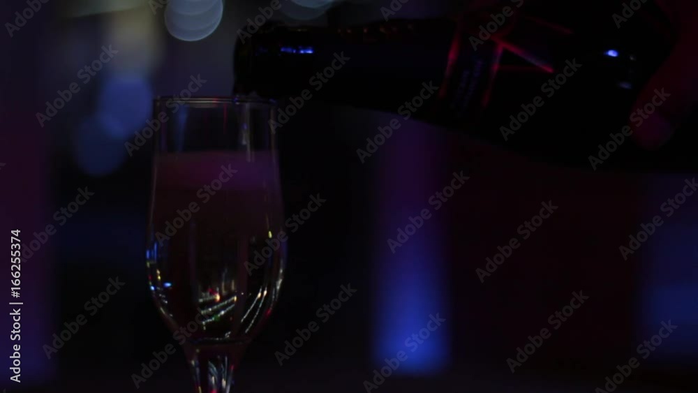 The look of an intoxicated man on a wine glass in which champagne is poured.