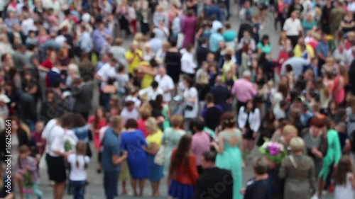 Wallpaper Mural Blurred Background - The Crowd, A Large Number of People Dressed in Bright Holiday Clothes Go to Different Parties. Summer Sunny Weather. Torontodigital.ca
