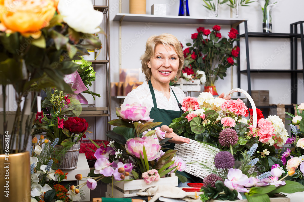 Florist with multicolored hortensia flowers .
