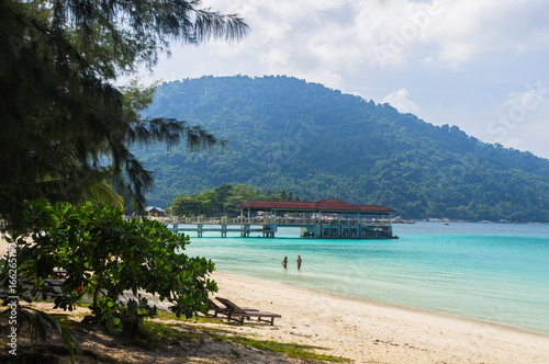 Pier on the white sand beach at Pulau Perhentian, Malaysia.