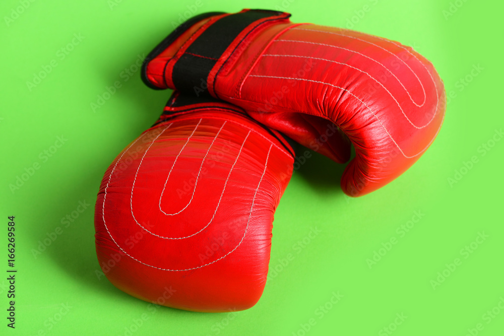 Concept of sports fight and protection with boxing gloves
