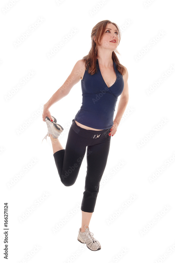 Woman standing in exercising outfit Woman standing in exercising outfit