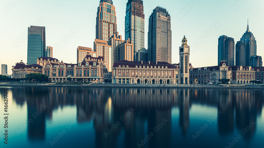 Obraz premium Tianjin city waterfront downtown skyline with Haihe river,China.