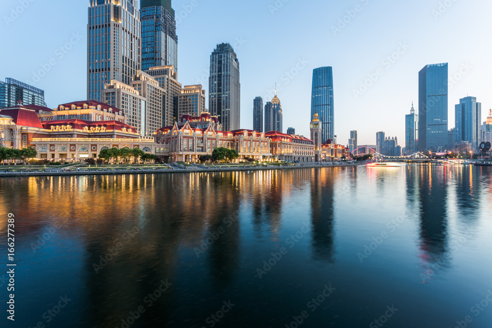 Tianjin city waterfront downtown skyline with Haihe river,China.