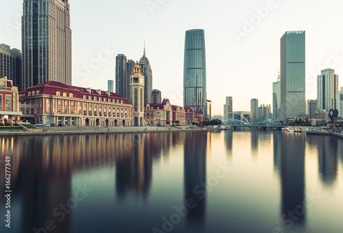 Tianjin city waterfront downtown skyline with Haihe river,China.