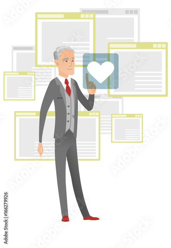 Senior businessman pressing web button with heart.