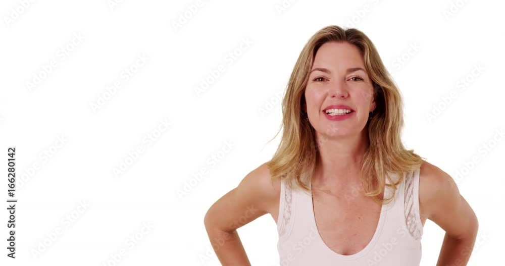 Woman on white background with copyspace, talking to camera and flirting Woman on white background with copyspace, talking to camera and flirting