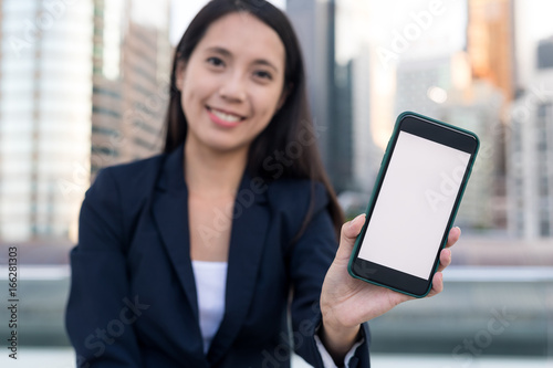 Business woman showing blank screen of the cellphone Free Download Business woman showing blank screen of the cellphone - GFXLoad