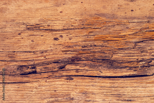 Rough old rustic wooden plank background with cracks