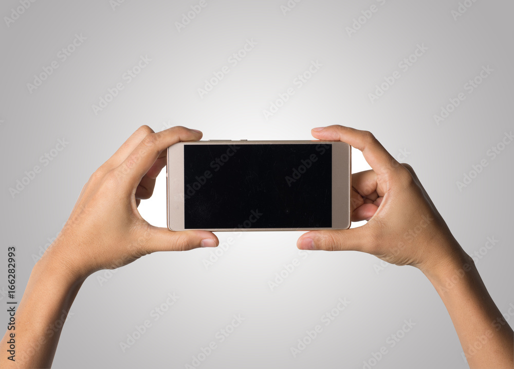 Woman Hand holding smart phone blank screen. Copy space. Hand holding smartphone isolated on white background. Woman Hand holding smart phone blank screen. Copy space. Hand holding smartphone isolated on white background.