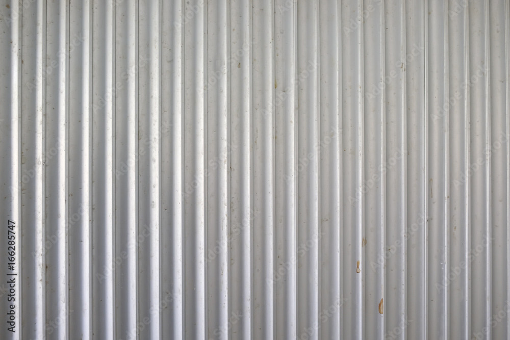 Old Background texture Aluminum metallic corrugated fence Old Background texture Aluminum metallic corrugated fence
