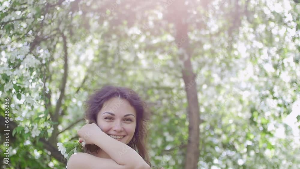 young woman enjoying in the background of the tree young woman enjoying in the background of the tree
