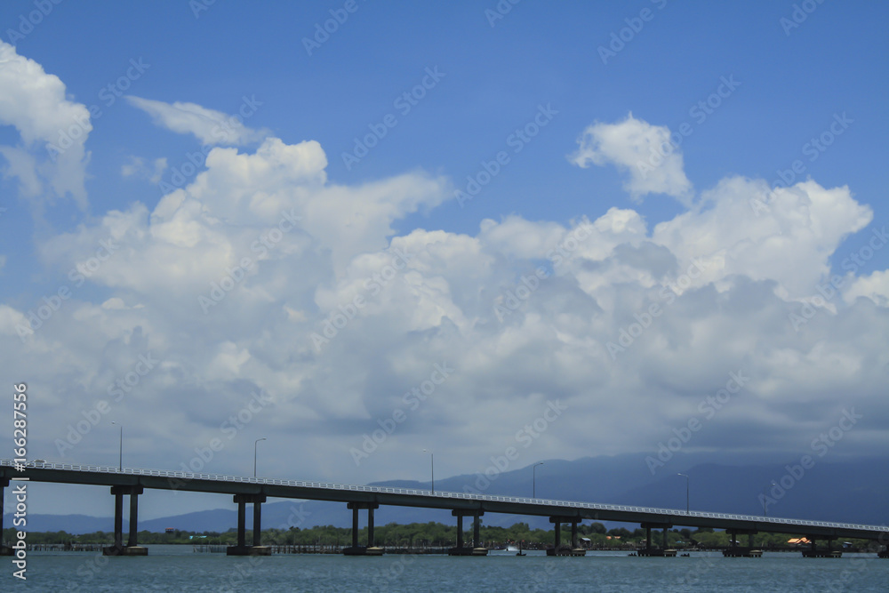 The Bridge across the sea and blue sky in Thailand