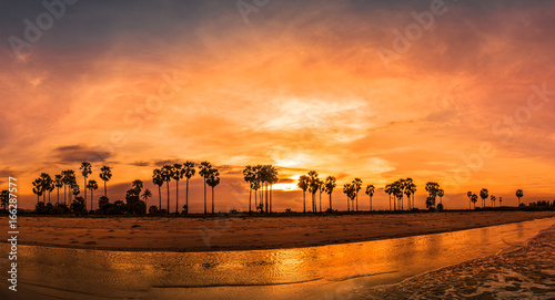 panorama of sunset beach on golden hour