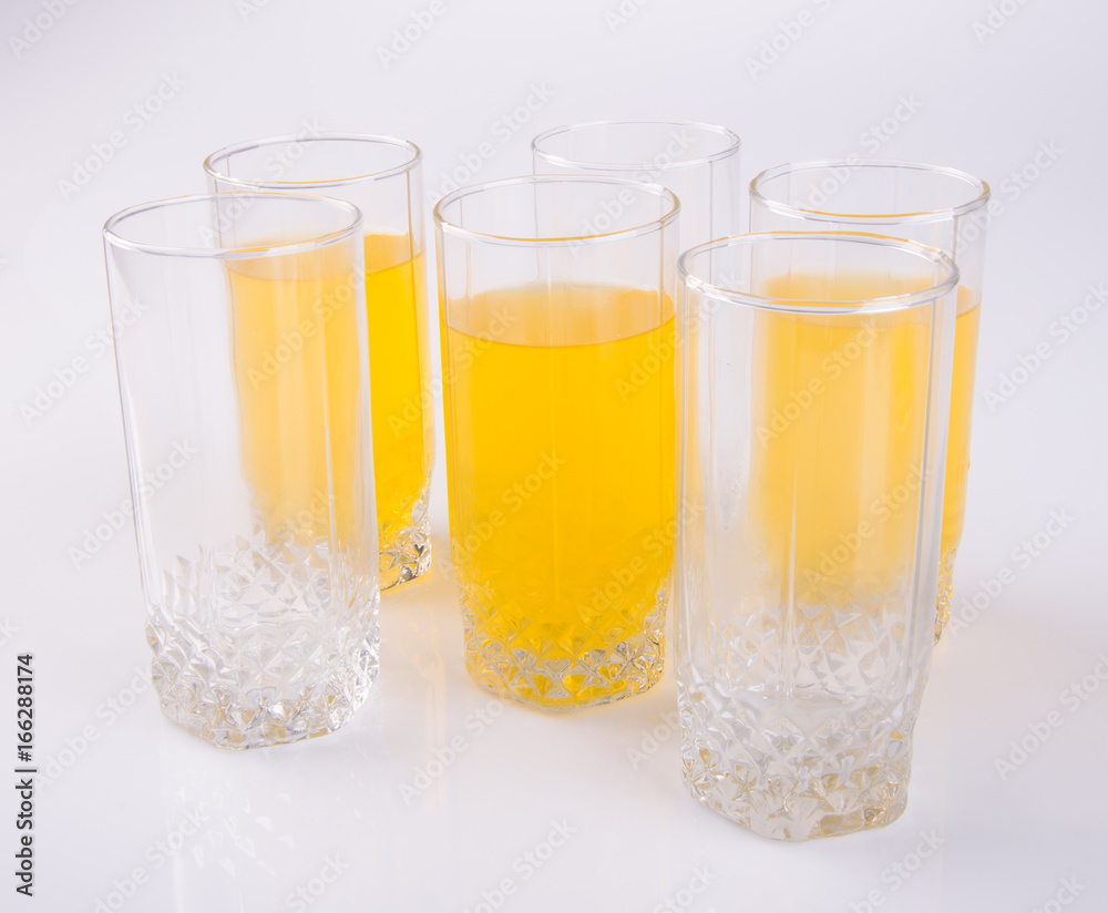 Orange juice in glasses on white background. Orange juice in glasses on white background.
