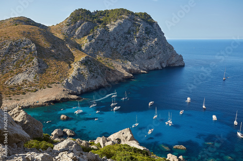 Spain, Balearic Islands, Maiorca, Sailing boats in beautiful bay near Formentor