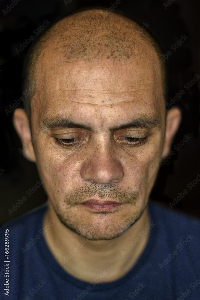 Portrait of a man on a dark background