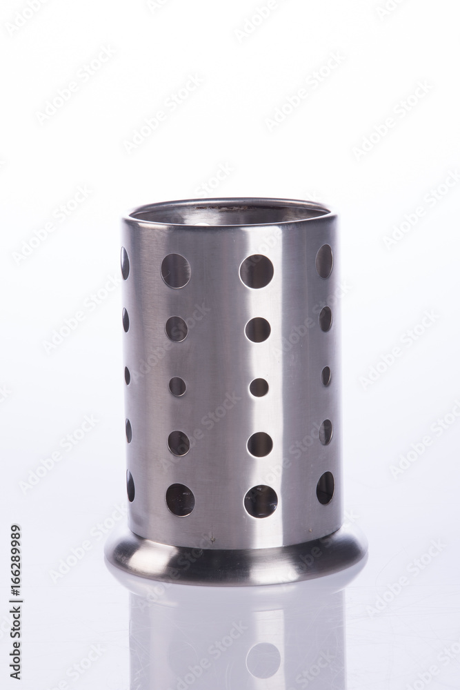 Kitchen utensils holder on background. Kitchen utensils holder on background.