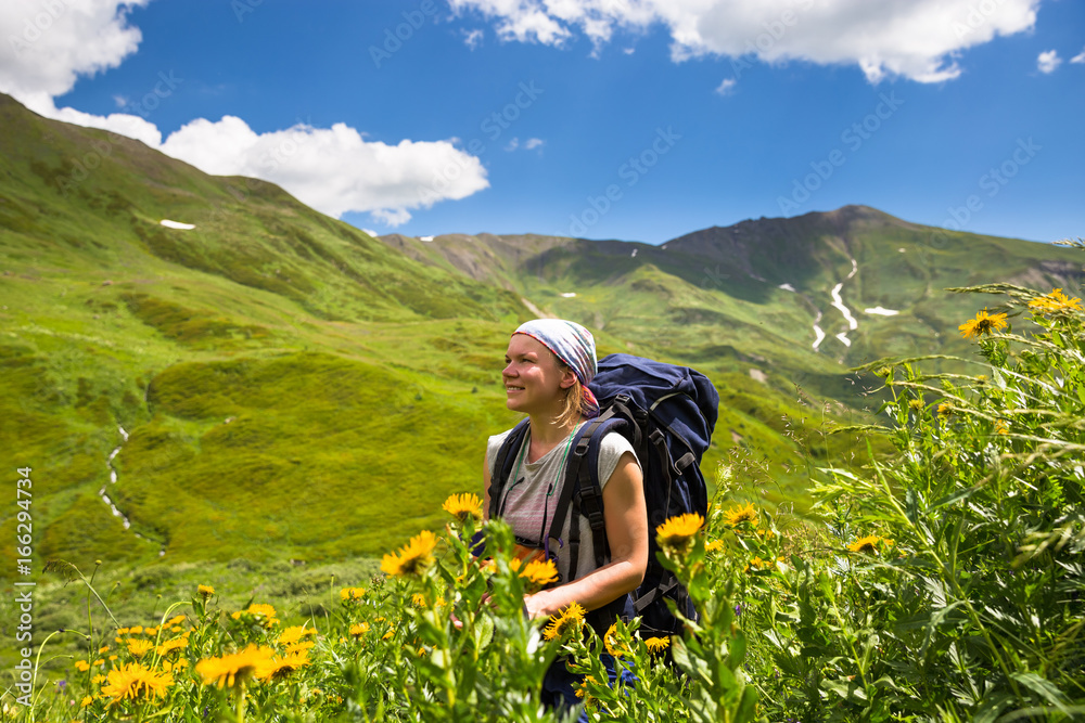 Happy hiker enjoy beautiful mountains. Relax summer time