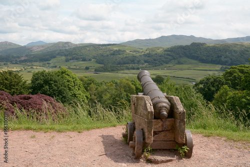 Old cannon on hillside