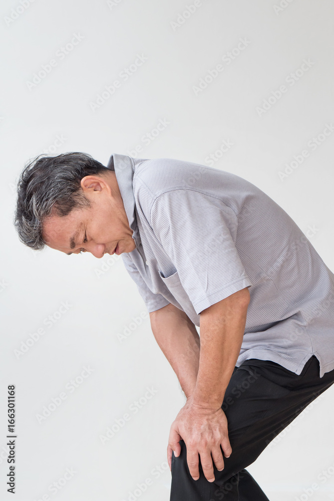 man hand holding knee joint pain, osteoporosis, gout, knee bone joint problem issue man hand holding knee joint pain, osteoporosis, gout, knee bone joint problem issue