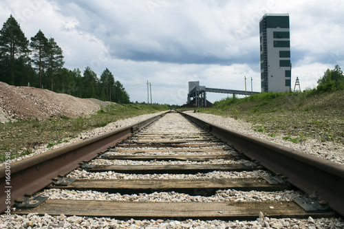 The railway leading to the mine enterprise, the prospect at the ground level photo