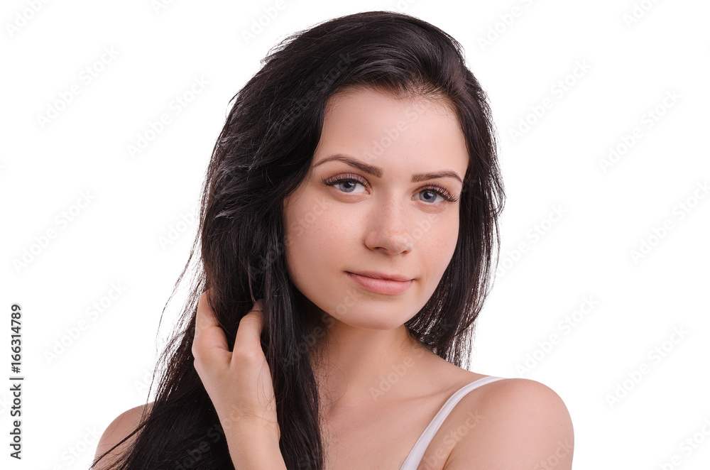 Young attractive girl smiling on a white background. Portrait. Beautiful woman. Young attractive girl smiling on a white background. Portrait. Beautiful woman.