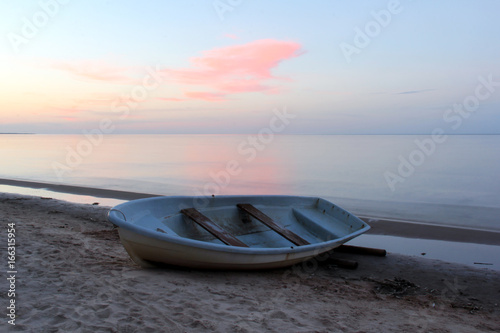 Baltic Sea and a fishing boat in Melnsils, Latvia