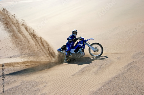Motocross bike in the sand