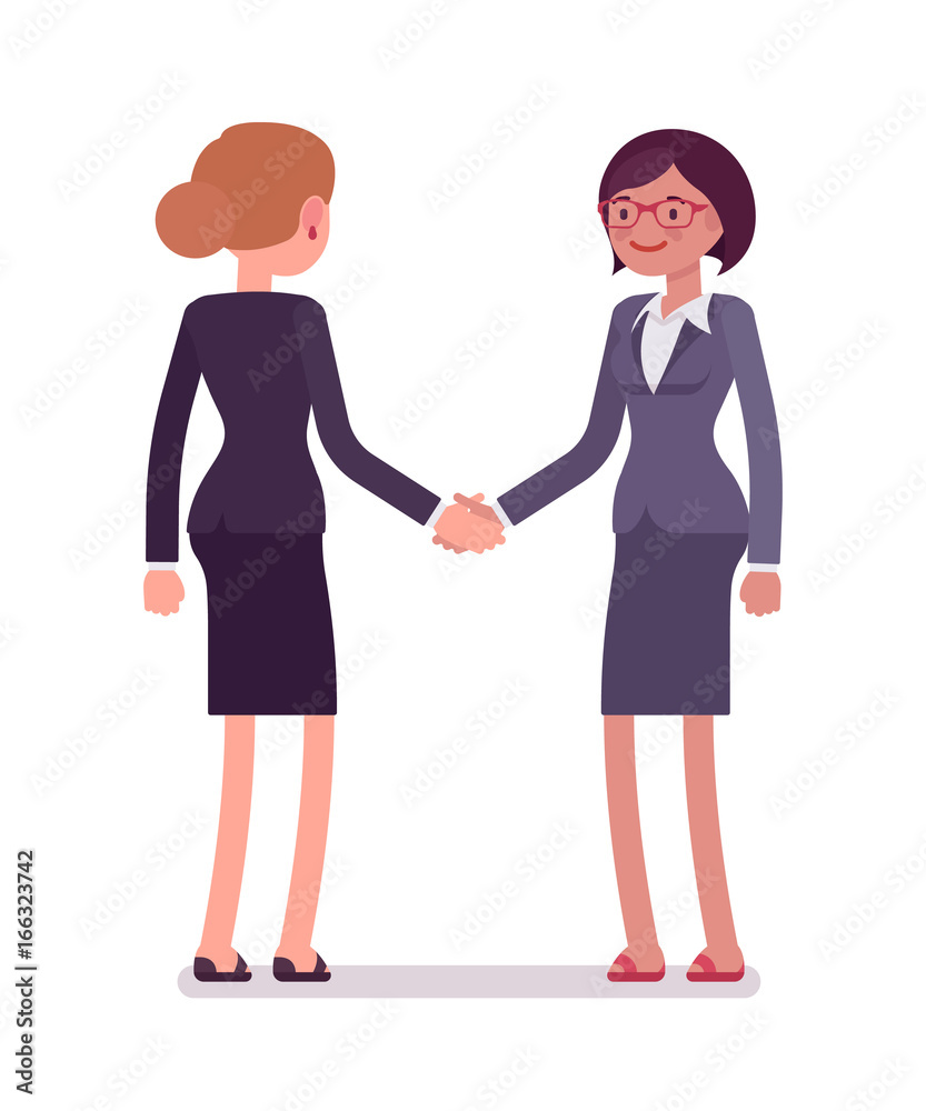 Business female partners handshaking