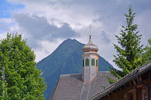 Kirche Rehmen mit Üntschenspitze (2135m), Bregenzerwald photo