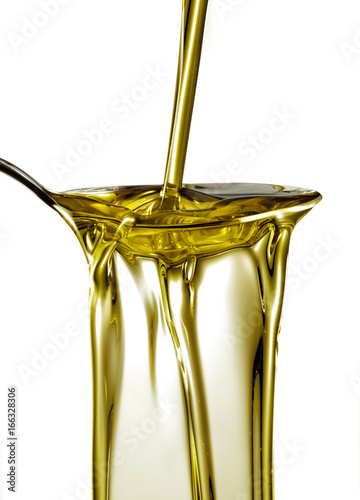 olive oil stream on spoon