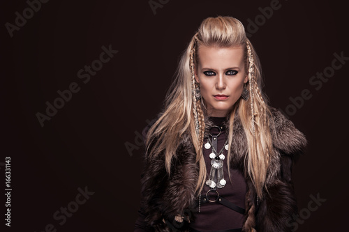 Fényképezés Portrait of viking woman in a traditional warrior clothes.