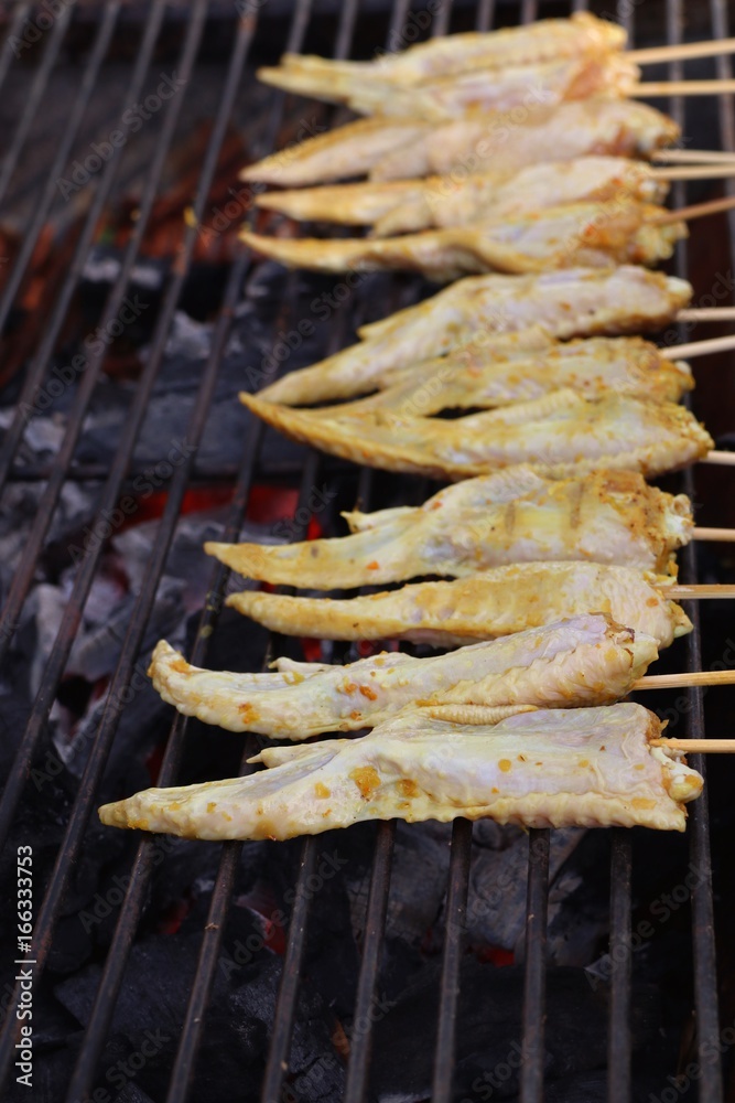 Chicken wings on barbecue grill